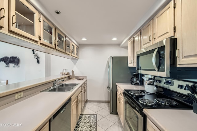 1120 Village Rd Unit 306, Beaver Creek, CO 81620 - kitchen with appliances with stainless steel finishes, a sink, light countertops, glass insert cabinets, and recessed lighting