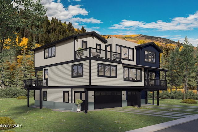 view of front of house with a front yard, a balcony, and an attached garage