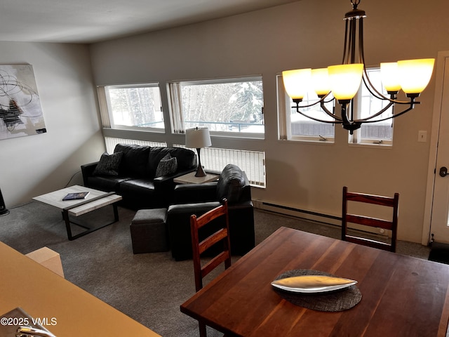 living room featuring an inviting chandelier, a baseboard radiator, and dark colored carpet