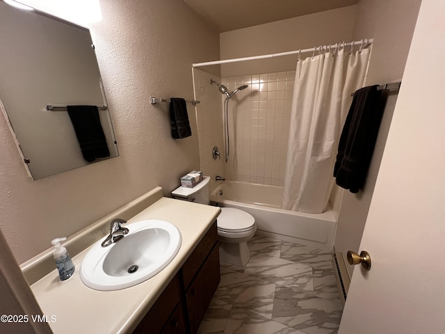 full bath with a textured wall, toilet, vanity, marble finish floor, and shower / bath combination with curtain