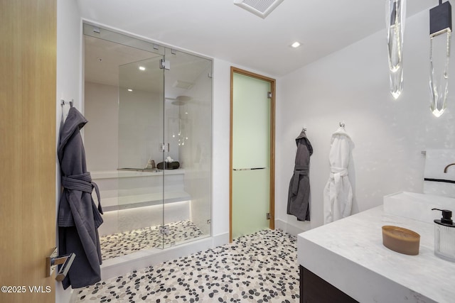 1326 Spraddle Creek Rd, Vail, CO 81657 - full bathroom with a shower stall, vanity, and recessed lighting
