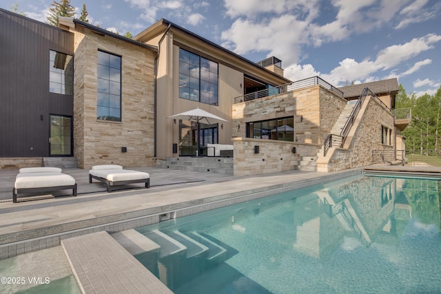 1326 Spraddle Creek Rd, Vail, CO 81657 - outdoor pool with stairway and a patio area