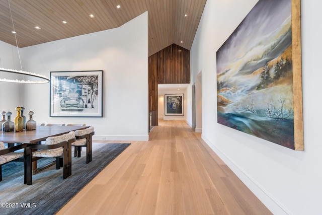 1326 Spraddle Creek Rd, Vail, CO 81657 - hallway with wood ceiling, wood finished floors, recessed lighting, high vaulted ceiling, and baseboards