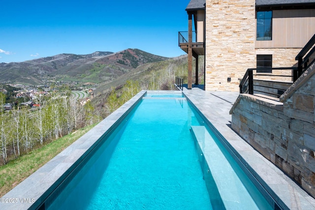 1326 Spraddle Creek Rd, Vail, CO 81657 - swimming pool featuring a mountain view