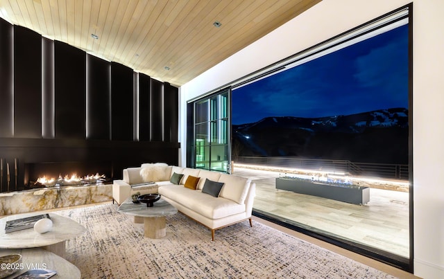1326 Spraddle Creek Rd, Vail, CO 81657 - interior space with an outdoor living space with a fireplace