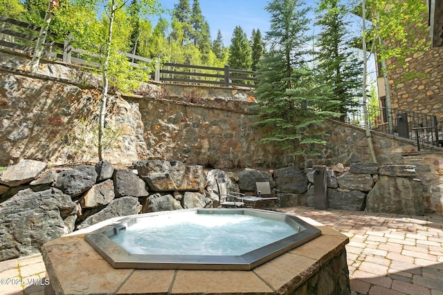 102 Village Walk, Beaver Creek, CO 81620 - view of pool featuring an outdoor hot tub and fence