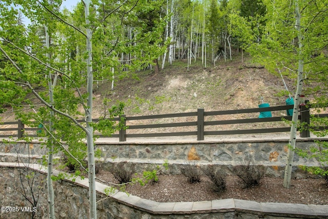102 Village Walk, Beaver Creek, CO 81620 - view of gate featuring fence