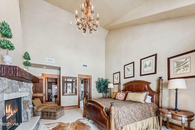 102 Village Walk, Beaver Creek, CO 81620 - bedroom featuring a chandelier, high vaulted ceiling, a fireplace, and visible vents