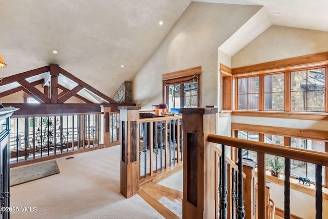 102 Village Walk, Beaver Creek, CO 81620 - hallway with high vaulted ceiling, recessed lighting, an upstairs landing, and carpet floors