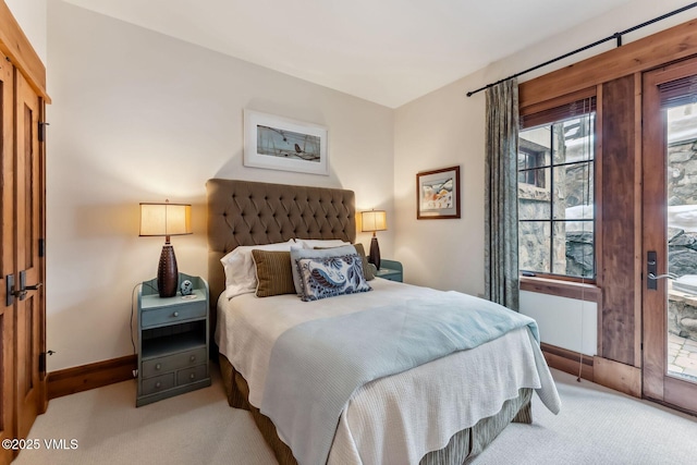 102 Village Walk, Beaver Creek, CO 81620 - bedroom featuring radiator heating unit, baseboards, and carpet floors