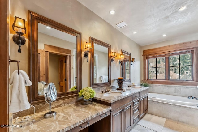 102 Village Walk, Beaver Creek, CO 81620 - full bath with visible vents, recessed lighting, a sink, tile patterned floors, and double vanity