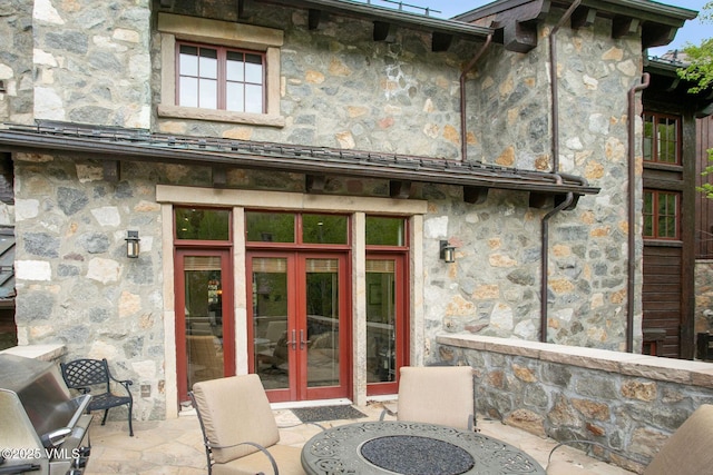 102 Village Walk, Beaver Creek, CO 81620 - back of house with a patio, french doors, and stone siding