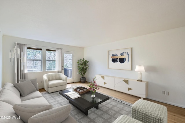 35 Chelsea Ct Unit 9, Eagle, CO 81631 - living area with baseboards and wood finished floors