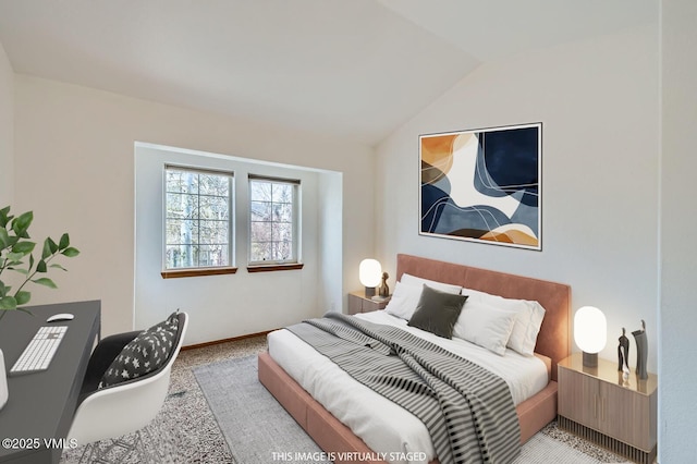 35 Chelsea Ct Unit 9, Eagle, CO 81631 - bedroom featuring baseboards, lofted ceiling, and carpet