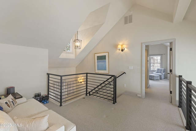 50 Bermuda Dr, Edwards, CO 81632 - interior space featuring visible vents, baseboards, high vaulted ceiling, and carpet