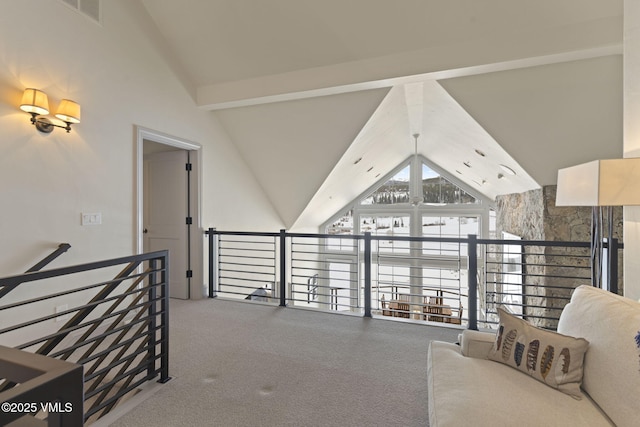 50 Bermuda Dr, Edwards, CO 81632 - interior space with high vaulted ceiling, carpet flooring, visible vents, and beam ceiling