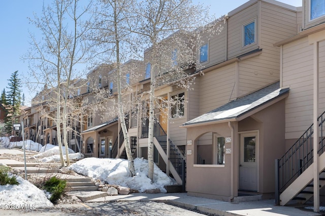 4192 Spruce Way Unit 209-A, Vail, CO 81657 - snow covered building featuring stairs