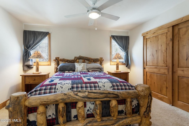 4192 Spruce Way Unit 209-A, Vail, CO 81657 - carpeted bedroom featuring multiple windows and ceiling fan