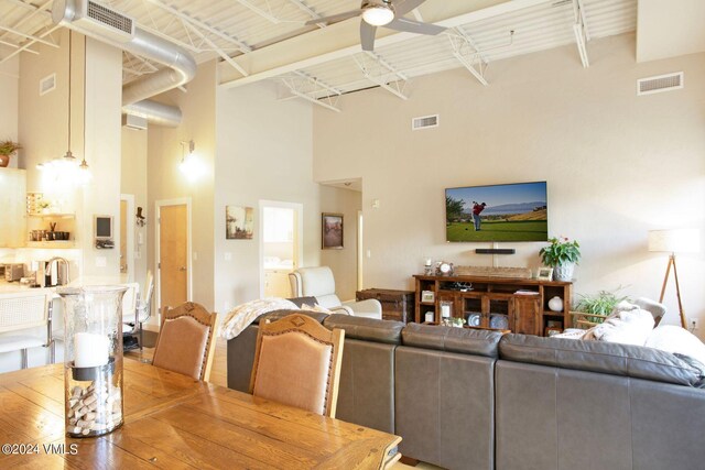 dining space featuring ceiling fan