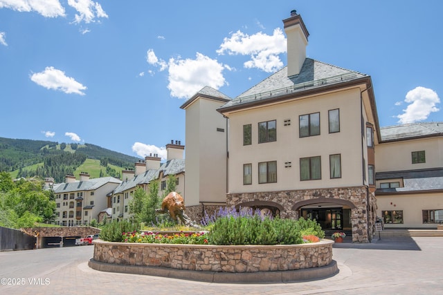 view of property with a mountain view