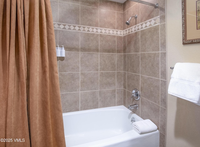 bathroom with shower / tub combo with curtain