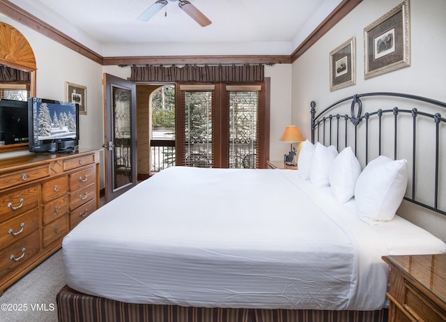 carpeted bedroom with access to outside and ceiling fan