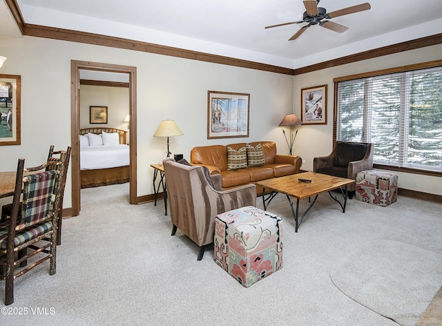 living room featuring light carpet and ceiling fan