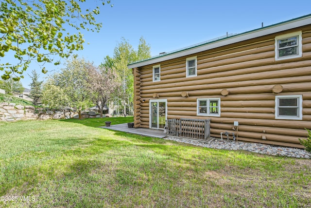 121 Hackamore Rd Unit B, Edwards, CO 81632 - rear view of house with a yard and log exterior