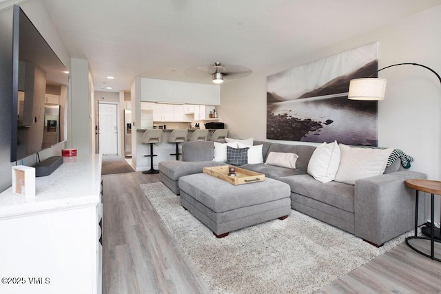 216 Main St Unit R316, Edwards, CO 81632 - living room with wood finished floors, ceiling fan, and recessed lighting