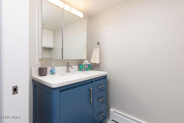 216 Main St Unit R316, Edwards, CO 81632 - bathroom featuring vanity and baseboard heating