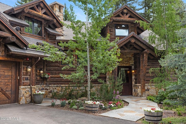 12 Cabin Creek Ln, Edwards, CO 81632 - view of front of house with log exterior