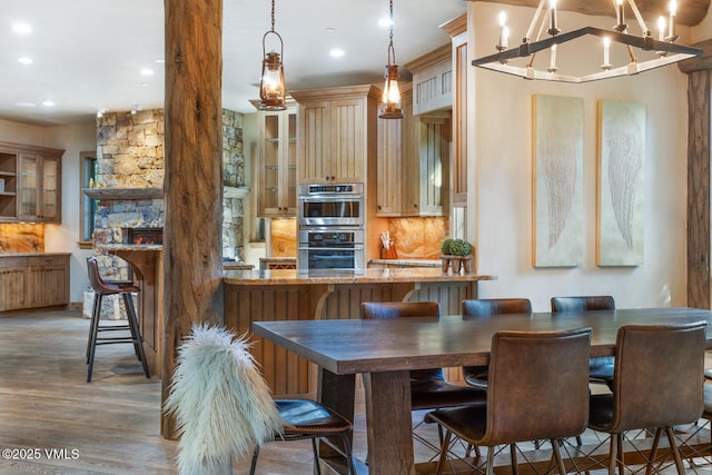 12 Cabin Creek Ln, Edwards, CO 81632 - dining room featuring wood finished floors, recessed lighting, and a chandelier