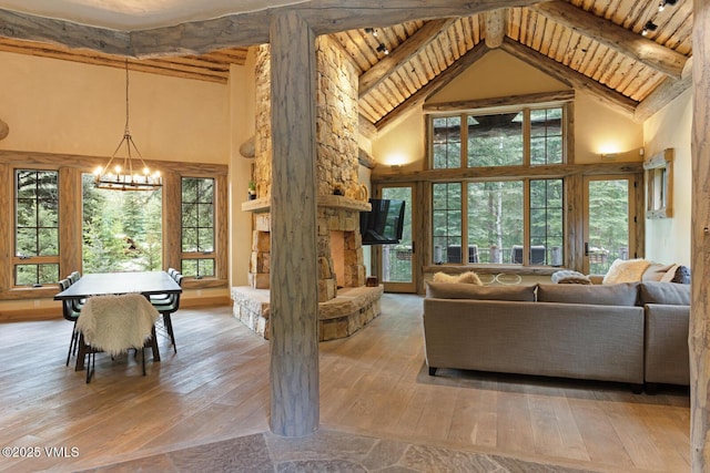 12 Cabin Creek Ln, Edwards, CO 81632 - living area with a chandelier, hardwood / wood-style flooring, high vaulted ceiling, and a wood ceiling with exposed beams