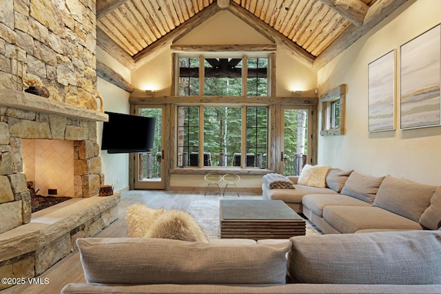 12 Cabin Creek Ln, Edwards, CO 81632 - living room featuring a wooden ceiling with exposed beams, high vaulted ceiling, and wood finished floors