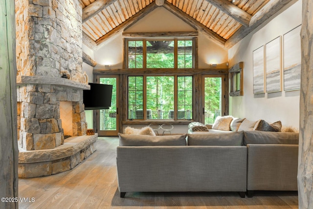 12 Cabin Creek Ln, Edwards, CO 81632 - living area with high vaulted ceiling, a wood ceiling with exposed beams, and hardwood / wood-style floors