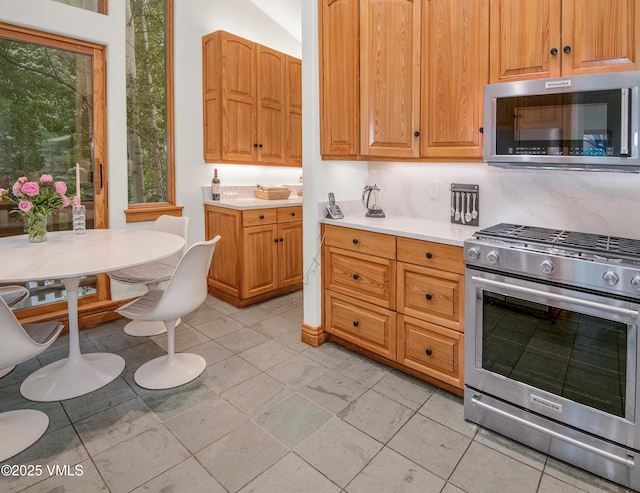 3827 Lupine Dr Unit B, Vail, CO 81657 - kitchen featuring appliances with stainless steel finishes and light countertops
