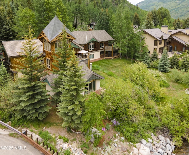 3827 Lupine Dr Unit B, Vail, CO 81657 - aerial view of property and surrounding area with mountains and a heavily wooded area