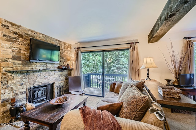 1880 Meadow Ridge Rd Unit 7, Vail, CO 81657 - living area featuring carpet floors and a stone fireplace
