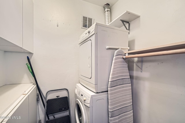 1880 Meadow Ridge Rd Unit 7, Vail, CO 81657 - laundry room featuring stacked washer and clothes dryer