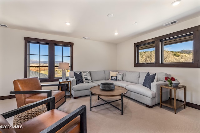 687 Hunters View Ln, Eagle, CO 81631 - living area featuring healthy amount of natural light, light carpet, and recessed lighting