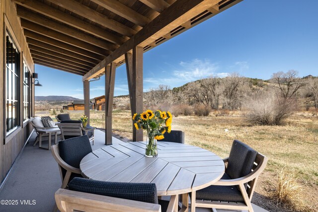 687 Hunters View Ln, Eagle, CO 81631 - view of patio with a mountain view and outdoor dining area