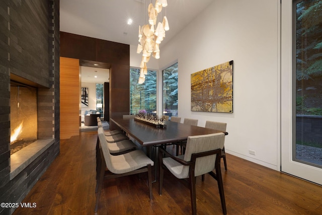 344 Beaver Dam Rd, Vail, CO 81657 - dining area featuring wood finished floors and a chandelier