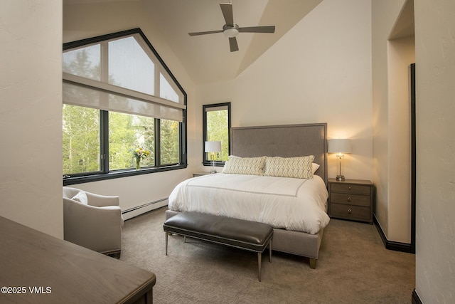 carpeted bedroom with a baseboard heating unit, high vaulted ceiling, and ceiling fan