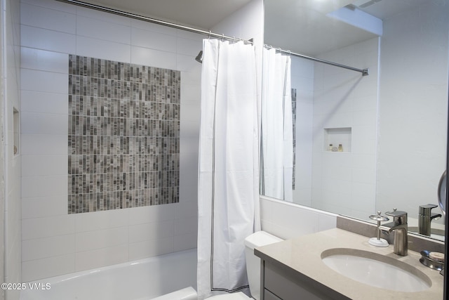 full bathroom with vanity, toilet, and shower / tub combo with curtain