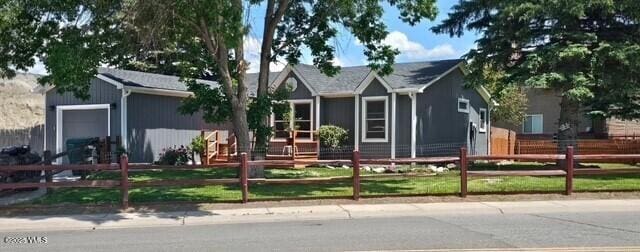 697 Schoolside St, Gypsum, CO 81637 - single story home featuring a fenced front yard