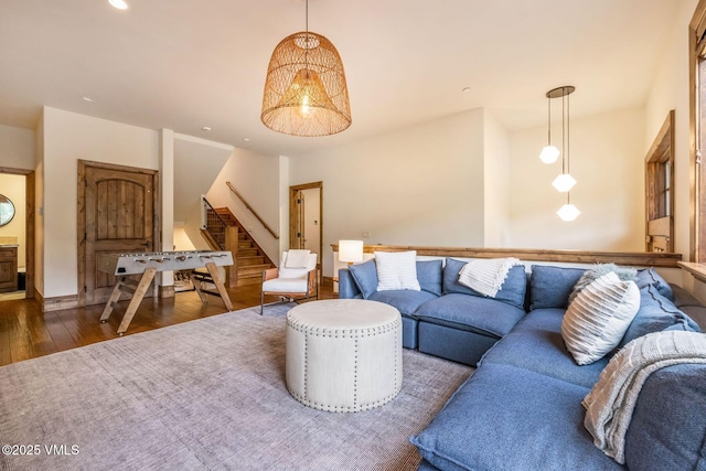 2417 Garmisch Dr Unit B, Vail, CO 81657 - living room with wood finished floors, stairway, and recessed lighting
