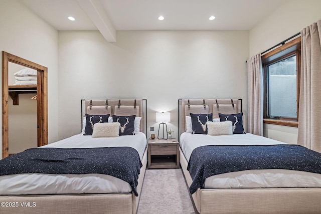 2417 Garmisch Dr Unit B, Vail, CO 81657 - carpeted bedroom with recessed lighting, a spacious closet, and beam ceiling