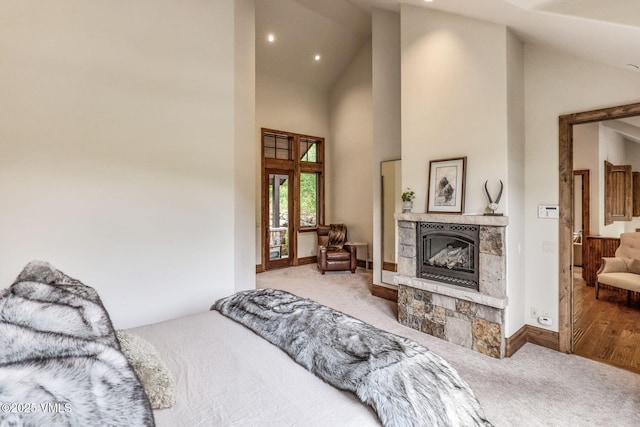 2417 Garmisch Dr Unit B, Vail, CO 81657 - bedroom featuring carpet, a fireplace, high vaulted ceiling, and recessed lighting