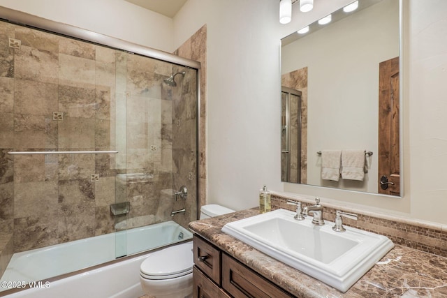 2417 Garmisch Dr Unit B, Vail, CO 81657 - bathroom featuring vanity and bath / shower combo with glass door