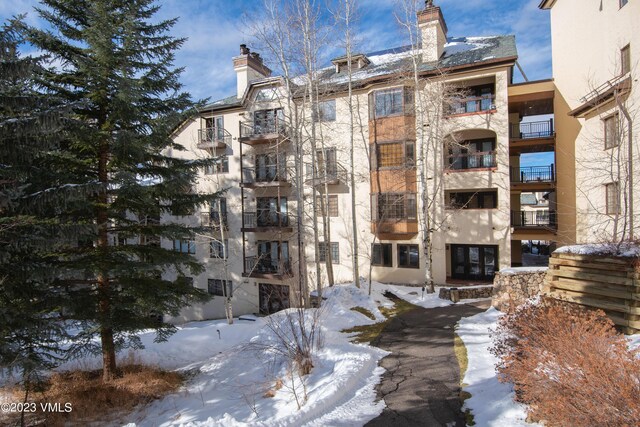 view of snow covered building